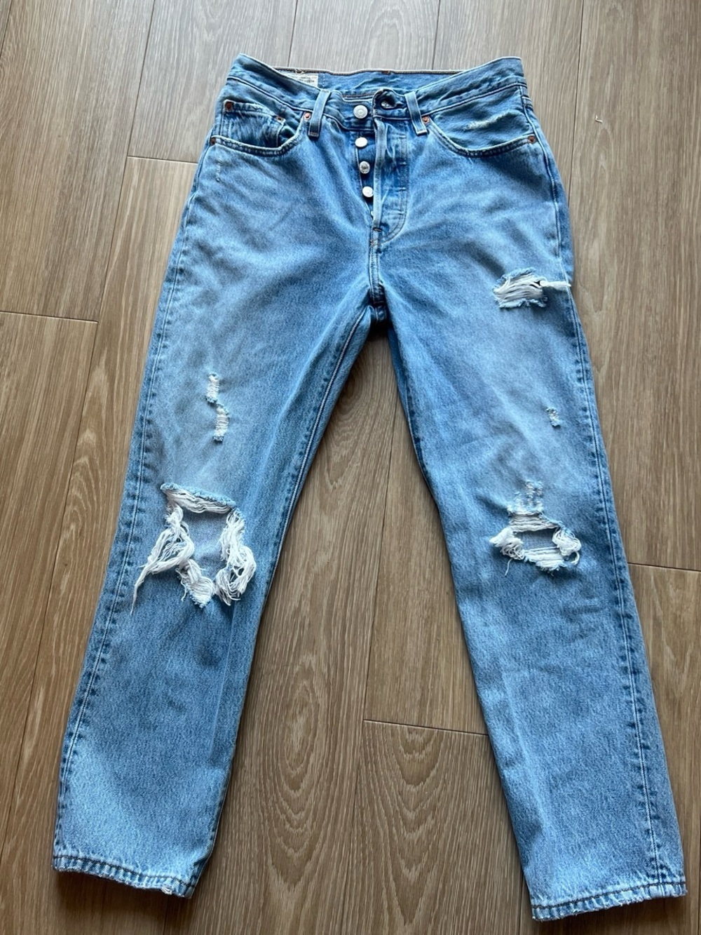 Levi's Premium 501 blue jeans with distressed details, size 26 #denim